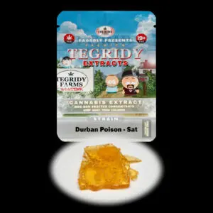 “Tegridy Extracts Durban Poison shatter concentrate featuring translucent light golden shatter with a crystal-clear glass-like appearance and stable texture.”