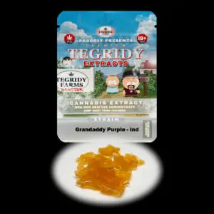 “Tegridy Extracts Grandaddy Purple shatter concentrate featuring translucent light golden shatter with a clear glass-like appearance and stable texture.”