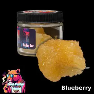 Peach Panther Blueberry hybrid cured resin beside its 1oz Baller Jar