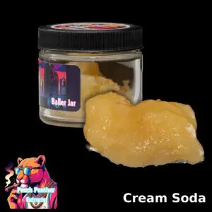 Peach Panther Cream Soda indica cured resin beside its 1oz Baller Jar