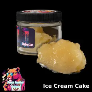 Peach Panther Ice Cream Cake indica cured resin beside its 1oz Baller Jar