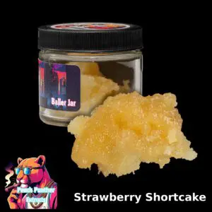 Peach Panther Strawberry Shortcake sativa cured resin beside its 1oz Baller Jar