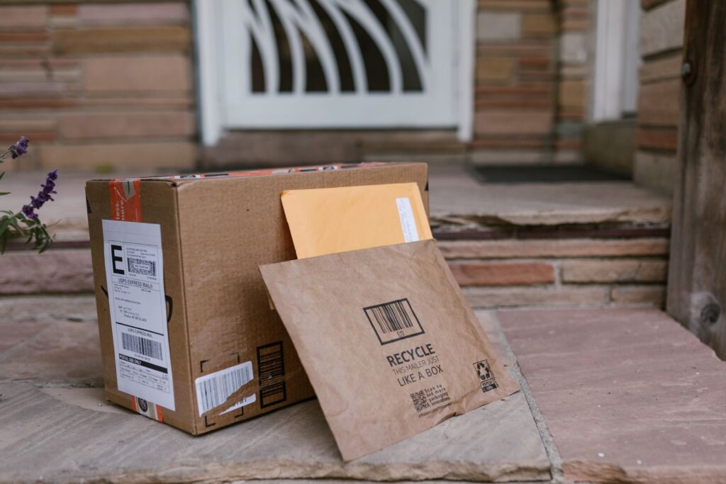 Cardboard delivery packages on a doorstep